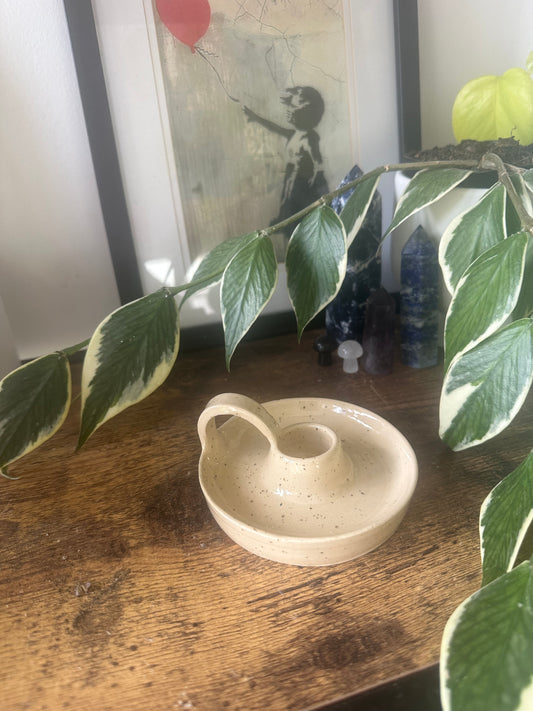 Speckled candle holder with handle